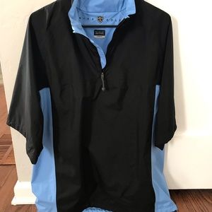 Nike golf. 1/4 zip short sleeve rain/wind jacket